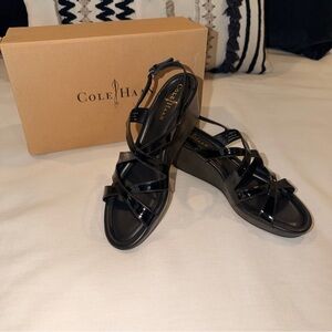 NWT - Cole Haan Black Patent Wedge Sandals with Strappy Design